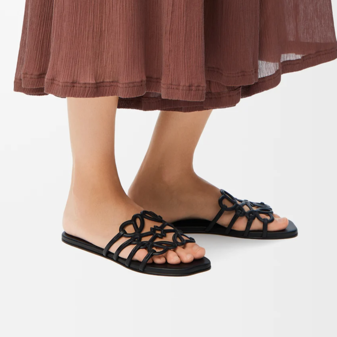 Slider Sandalias Abstractas