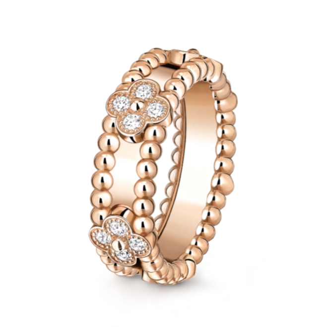 anillo de perlas, anillo trébol, anillo elegante, anillo de mujer, anillo de lujo, anillo moderno, anillo sofisticado, anillo con gemas, anillo brillante, anillo versátil, anillo atemporal, a