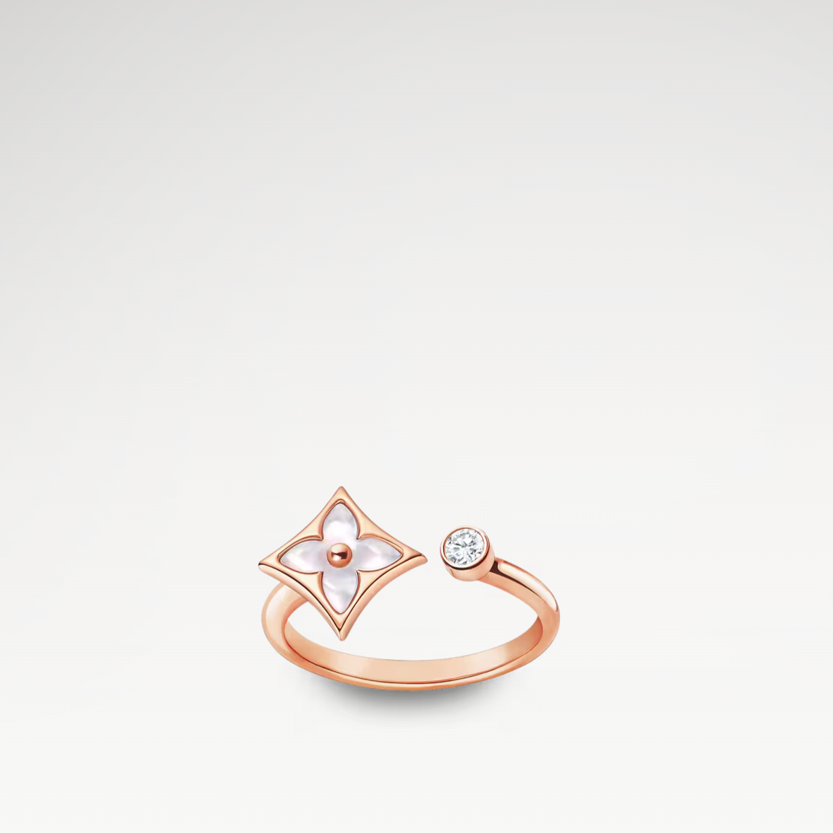 Anillo floral elegante y femenino, diseño delicado con flores, anillo de flores refinado, joyas florales apilables, conjunto de joyas coordinado, pieza de joyería sofisticada, anillo con tema de la naturaleza, joyería clásica moderna, accesorio delicado, anillo elegante y coordinado, joya femenina y refinada, diseño floral único y apilable.