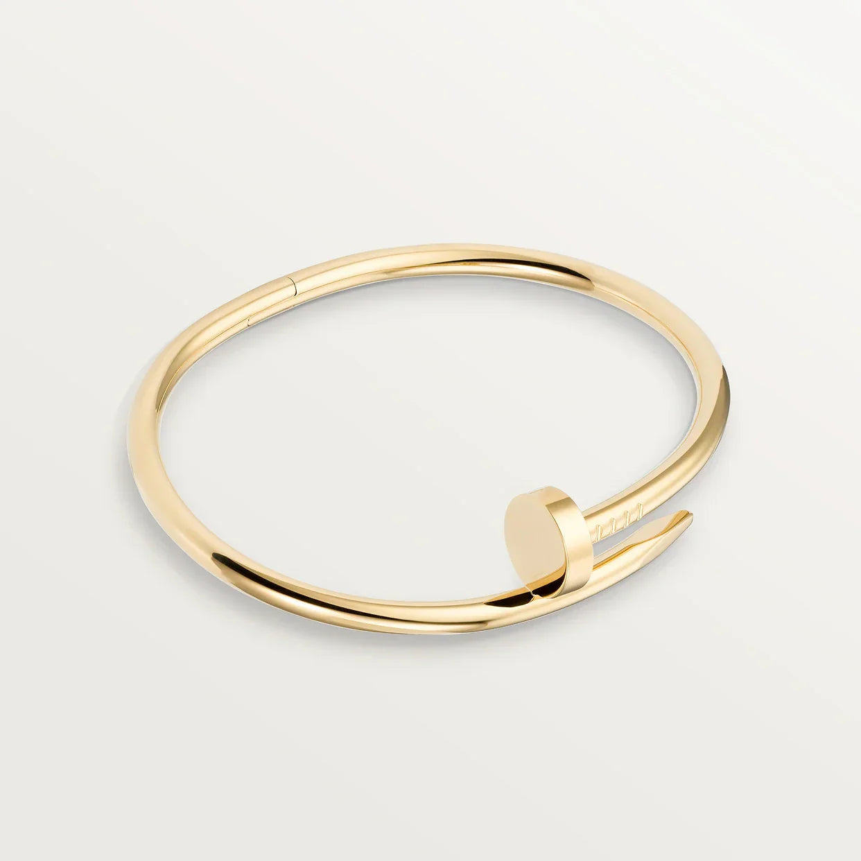 Brazalete minimalista con cierre de tornillo, diseño moderno y sofisticado, accesorio versátil para ocasiones formales, joyería de lujo accesible y refinada, brazalete elegante y accesible, joyería de diseño sofisticado y contemporáneo, brazalete de lujo y moderno, accesorio de joyería formal y minimalista, lujo accesible y diseño moderno en joyería.